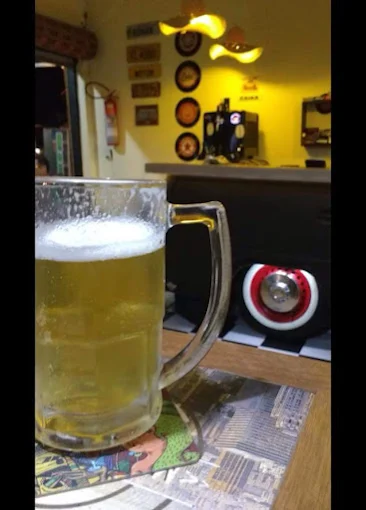 Caneca de chopp gelado servida no Ronan Lanches